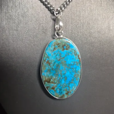 Sale Photo Thumbnail #129: Navajo Sterling Silver Blue Spiderweb Turquoise Necklace Pendant & Cuff Bracelet
> pendant marked 925, on sterling continuous chain 18'
> stone set in sterling bezel
> cuff bracelet has 2 turquoise stones at opening.
great set