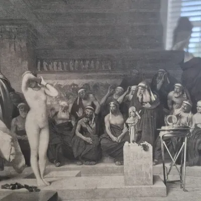 Sale Photo Thumbnail #162: Pair Vintage photogravure prints framed ~ 1881 paintings by Jules Girardet
> Siege of Saragossa, Peninsular War 1808
> Phryne before the Areopagus [Jean Leon Gerome]
both are in glass black edge frames ;  18/16