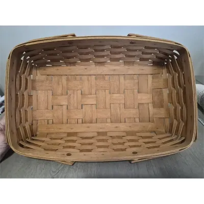 Sale Photo Thumbnail #185: Longaberger Double Swing Handle Large Gathering Basket 16" X 12" Signed 1993
with 2 swing handles.

Basket in Vg condition, no damage, broken spines. Scuffs commensurate with age and vintage.
Handles are excellent, low usage if any, no stains

Dimensions
