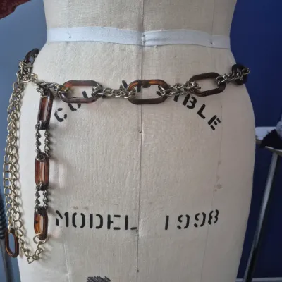 Sale Photo Thumbnail #209: The Limited Goldtone Paperclip Chain Necklace 36 in + ext.
> faux tortoise shell paperclips 15 total
> extension is 20" with end paperclip;;;;;; lobster closure
> chain is antique gold tone......paperclips are deep tortoise.
Great belt and no cheaply made