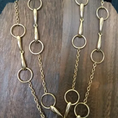 Sale Photo Thumbnail #290: Chaps  Gold Tone Oval Link Chain Necklace Toggle Closure Signed
>toggle closure, signed on bar
> new as found
> 18" length