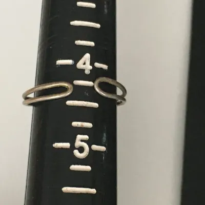 Sale Photo Thumbnail #323: Vintage Ring tested 925 STERLING SILVER Size 4 Wire Band 
excellent condition, cleaned and toned to luster.
WGT: 1.36g //////size 4 adjustable
