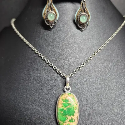 Sale Photo Thumbnail #335: 925 Sterling Silver Variscite Pendant: Natural Gemstone & Earrings 
Pendant marked 925 on a 925 sterling chain, marked on lobster clasp
Earrings are 3 layers as pictured.