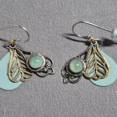 Sale Photo Thumbnail #338: 925 Sterling Silver Variscite Pendant: Natural Gemstone & Earrings 
Pendant marked 925 on a 925 sterling chain, marked on lobster clasp
Earrings are 3 layers as pictured.
