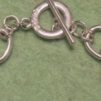 Sale Photo Thumbnail #342: Chaps silver tone link bracelet with toggle clasp....marked
Condition is Pre-owned.......excellent