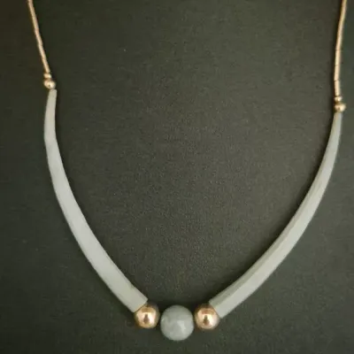 Sale Photo Thumbnail #346: Genuine Guatemalan Jadeite Necklace with Dentalium Sea shell & Earrings
The ball is carved from genuine Guatemalan jadeite, with carved polished Dentalium Sea shell, treasured since ancient Maya civilization for its spiritual significance, durability, and