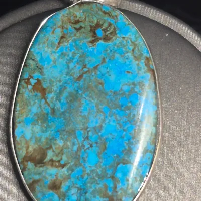 Sale Photo Thumbnail #354: Navajo Sterling Silver Blue Spiderweb Turquoise Necklace Pendant & Cuff Bracelet
> pendant marked 925, on sterling continuous chain 18'
> stone set in sterling bezel
> cuff bracelet has 2 turquoise stones at opening.
great set