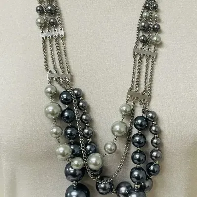 Sale Photo Thumbnail #366: Statement fashion jewelry assortment with a bold mix of layered necklaces, earrings and coordinating sets featuring turquoise-tone accents, smoky and metallic beads, faceted crystals, rhinestones, black cabochons, cat-eye style stones, chunky chains, pend