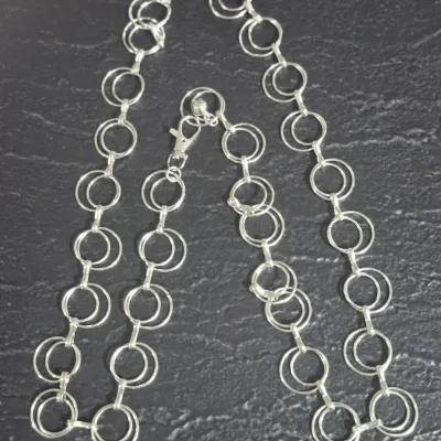 Sale Photo Thumbnail #368: Vintage FASHIONABLE Chain Belt ~ AL Rings 
Now the hot fashion on runways and ads.
all Aluminum circles chain with easy lobster claw clasp
size:  42"