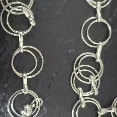 Sale Photo Thumbnail #371: Vintage FASHIONABLE Chain Belt ~ AL Rings 
Now the hot fashion on runways and ads.
all Aluminum circles chain with easy lobster claw clasp
size:  42"