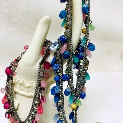 Sale Photo Thumbnail #374: Colorful fashion jewelry assortment featuring an eclectic mix of beaded eyeglass holder necklaces, bracelets and pierced earrings in vibrant glass, stone-look and decorative beads with silver- and gold-toned accents