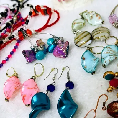 Sale Photo Thumbnail #375: Colorful fashion jewelry assortment featuring an eclectic mix of beaded eyeglass holder necklaces, bracelets and pierced earrings in vibrant glass, stone-look and decorative beads with silver- and gold-toned accents