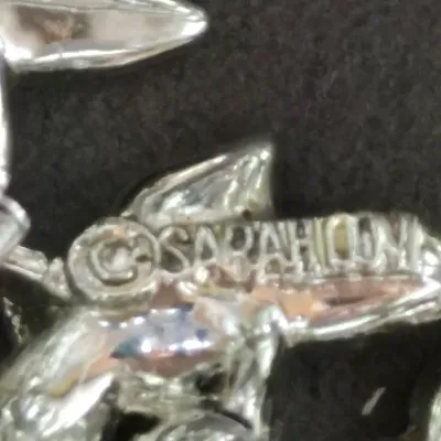 Sale Photo Thumbnail #397: Vintage 1950s Sarah Coventry Rhinestone Bracelet: Silver Leaf Jewelry & Leaf Earrings
> bracelet is 3 rows of rhinestones, secure snap clasp w/ safety ext.
> Earrings are Emeco clip ons
both in super fine condition