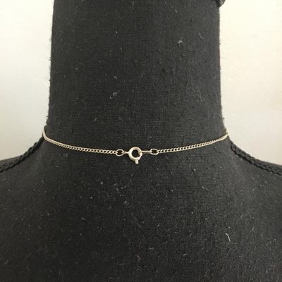 Glass pendant and silver tone chain