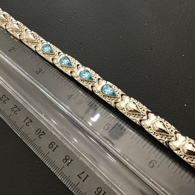 Nice Quality Blue Tear Drop Center Stones Set in Silver Tone flip over Clasp