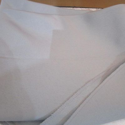 Sale Photo Thumbnail #33: Like new white tablecloth is rectangular 101" x 60", gray tablecloth is round 96" in diameter, see pictures