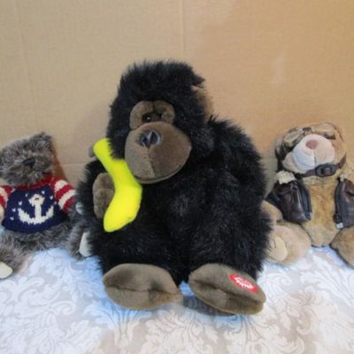 Sale Photo Thumbnail #614: 11" Gorilla sings "Bananas Over You" and vibrates takes 2 AA batteries not included. Aviator bear is 7", Bear with anchor is 7" tall. See  pictures