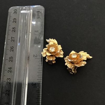 Gold tone Coro flower clip on earrings