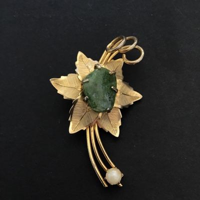 Gold tone flower brooch with stone and faux pearl