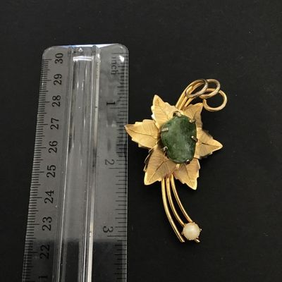 Gold tone flower brooch with stone and faux pearl