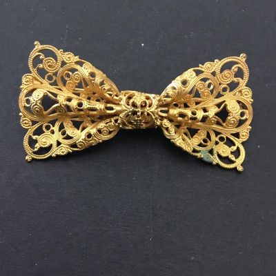Beautiful, vintage, gold tone, filigree bow brooch