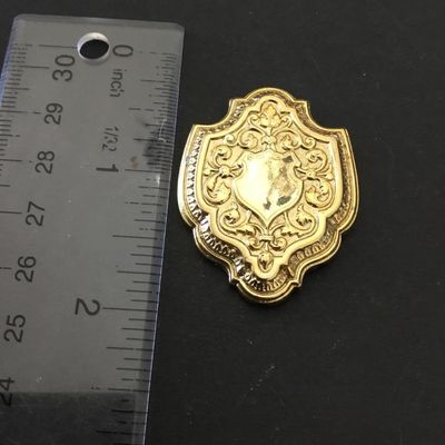 Gold, toned, vintage brooch