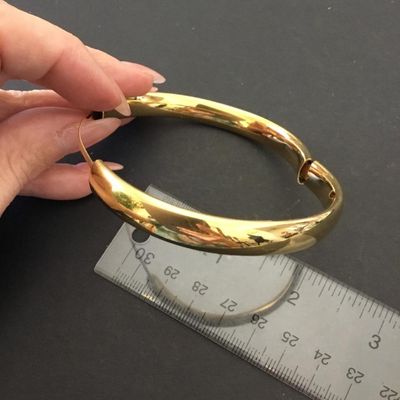 Beautiful very nice vintage Monet, gold toned Bengal hinged bracelet. Excellent condition.