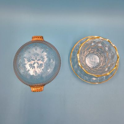 Pressed Glass Serving Dish (handled) + Cut-Style Glass Cup & Saucer with Gold Trim — 3 pcs