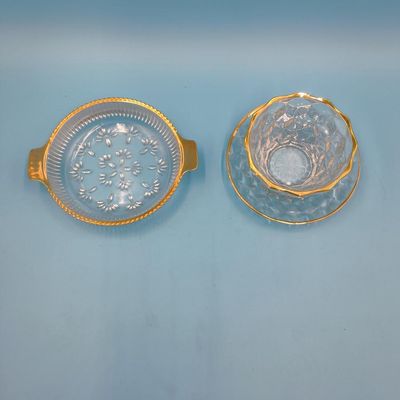 Pressed Glass Serving Dish (handled) + Cut-Style Glass Cup & Saucer with Gold Trim — 3 pcs