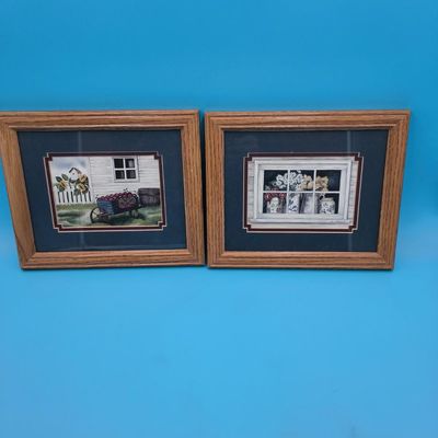 Pair of Framed Country/Floral Prints in Wood‑Tone Frames (2)