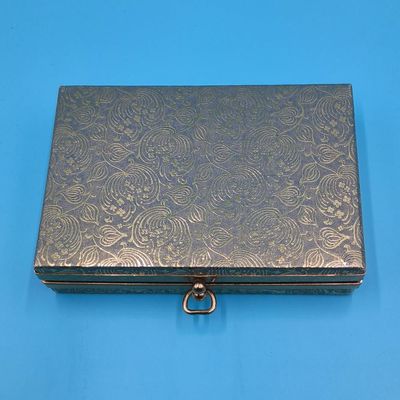 Claussner glass‑mirrored jewelry box with assorted beaded and silver‑tone chains