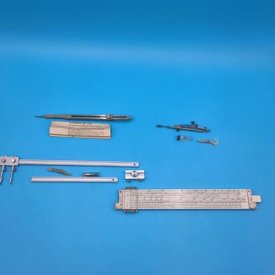 Alvin drafting set with metal slide rule, compasses/dividers and cases