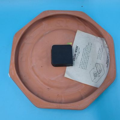 Lillian Vernon Terra Cotta‑Colored Octagonal Wall Clock (1)