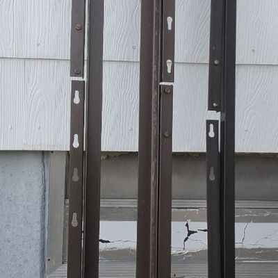Lot of 4 Brown Metal Slotted Uprights/Standards with Casters & Lamp Sockets