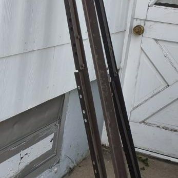 Lot of 4 Brown Metal Slotted Uprights/Standards with Casters & Lamp Sockets