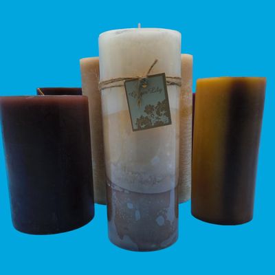 Lot of 9 Assorted Pillar Wax Candles — Mixed Colors, one tagged 'Ginger Lily'
