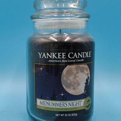 Lot of approximately 11 Yankee Candle glass jar candles — assorted scents & sizes