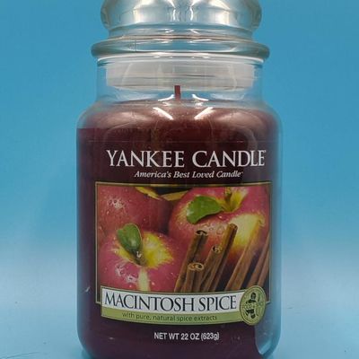 Lot of approximately 11 Yankee Candle glass jar candles — assorted scents & sizes