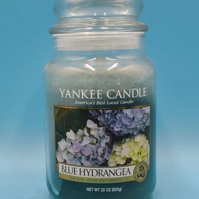 Lot of approximately 11 Yankee Candle glass jar candles — assorted scents & sizes