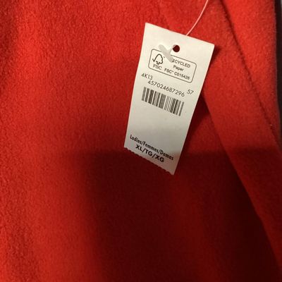 Sale Photo Thumbnail #8: NWT (New with tags) red fleece quarter-zip pullover from The Disney Store, featuring embroidered Minnie Mouse patch on the left chest and embroidered 'Nina' name detail on the right chest. 100% polyester fleece construction. Brand tags attached. Size: Lad