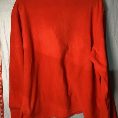 Sale Photo Thumbnail #9: NWT (New with tags) red fleece quarter-zip pullover from The Disney Store, featuring embroidered Minnie Mouse patch on the left chest and embroidered 'Nina' name detail on the right chest. 100% polyester fleece construction. Brand tags attached. Size: Lad