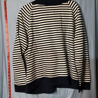 Sale Photo Thumbnail #19: Liz Claiborne navy blue and white horizontal striped long-sleeve sweatshirt with a front kangaroo pocket and drawstring collar. Size 1X. Measures approximately 27 inches in length. In good pre-owned condition with no visible stains or tears.