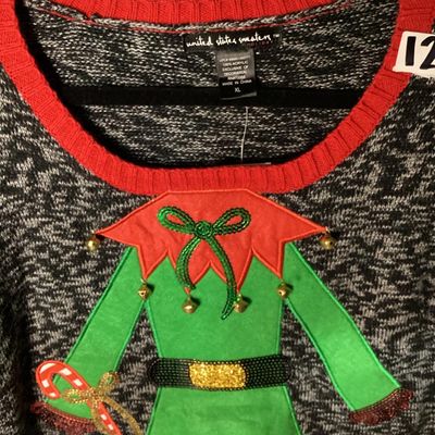 Sale Photo Thumbnail #21: United States Sweaters Holiday brand ugly Christmas sweater tunic with an elf body design featuring sequins, jingle bells, and 3D applique details. New with tags from Kohl's (MSRP $50.00). 

- Brand: United States Sweaters Holiday
- Size: XL
- Color: Blac
