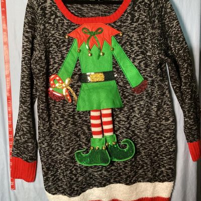 Sale Photo Thumbnail #20: United States Sweaters Holiday brand ugly Christmas sweater tunic with an elf body design featuring sequins, jingle bells, and 3D applique details. New with tags from Kohl's (MSRP $50.00). 

- Brand: United States Sweaters Holiday
- Size: XL
- Color: Blac