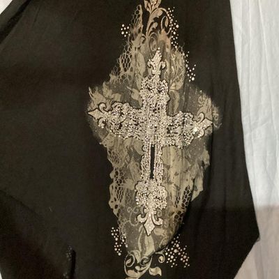 Sale Photo Thumbnail #29: Vocal brand black short sleeve V-neck tunic top or mini dress featuring an asymmetrical handkerchief hemline. Elaborately embellished with lace print, scrollwork, and rhinestone-encrusted cross designs on the lower sides. Made in the USA. Measures approxi