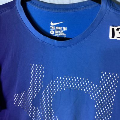 Sale Photo Thumbnail #50: Men's Nike short sleeve t-shirt featuring the Kevin Durant KD logo printed on the front. Features a two-tone blue and purple color block style design. Marked size XL (Athletic Cut). Gently used condition with light wear and minor wrinkling.
