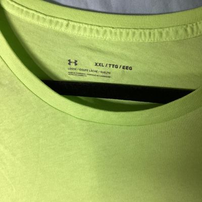 Sale Photo Thumbnail #59: Under Armour men's short sleeve T-shirt in neon green / lime yellow. Loose fit style, size XXL . Features black Under Armour logo printed on the left chest and back upper neck. Lightly used condition with light wrinkling, no obvious tears or major stains 