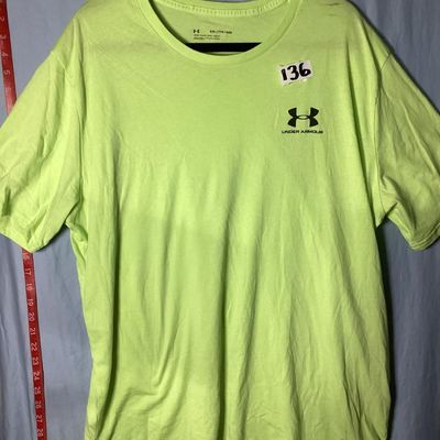 Sale Photo Thumbnail #57: Under Armour men's short sleeve T-shirt in neon green / lime yellow. Loose fit style, size XXL . Features black Under Armour logo printed on the left chest and back upper neck. Lightly used condition with light wrinkling, no obvious tears or major stains 