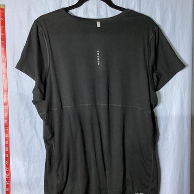 Sale Photo Thumbnail #64: Nike Running Dri-FIT short sleeve athletic top in black. Features small silver reflective Nike swoosh logo on front chest and reflective accent dots on the back. Tag size Women's 1X. Made in Thailand. Overall good pre-owned condition with light wear. Tota