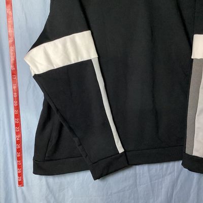 Sale Photo Thumbnail #73: Black Nike crewneck sweatshirt with embroidered center swoosh and white and grey color-blocked stripes on the sleeves. Tagged size XL made in Vietnam. Appears lightly used with no major flaws or visible damage.